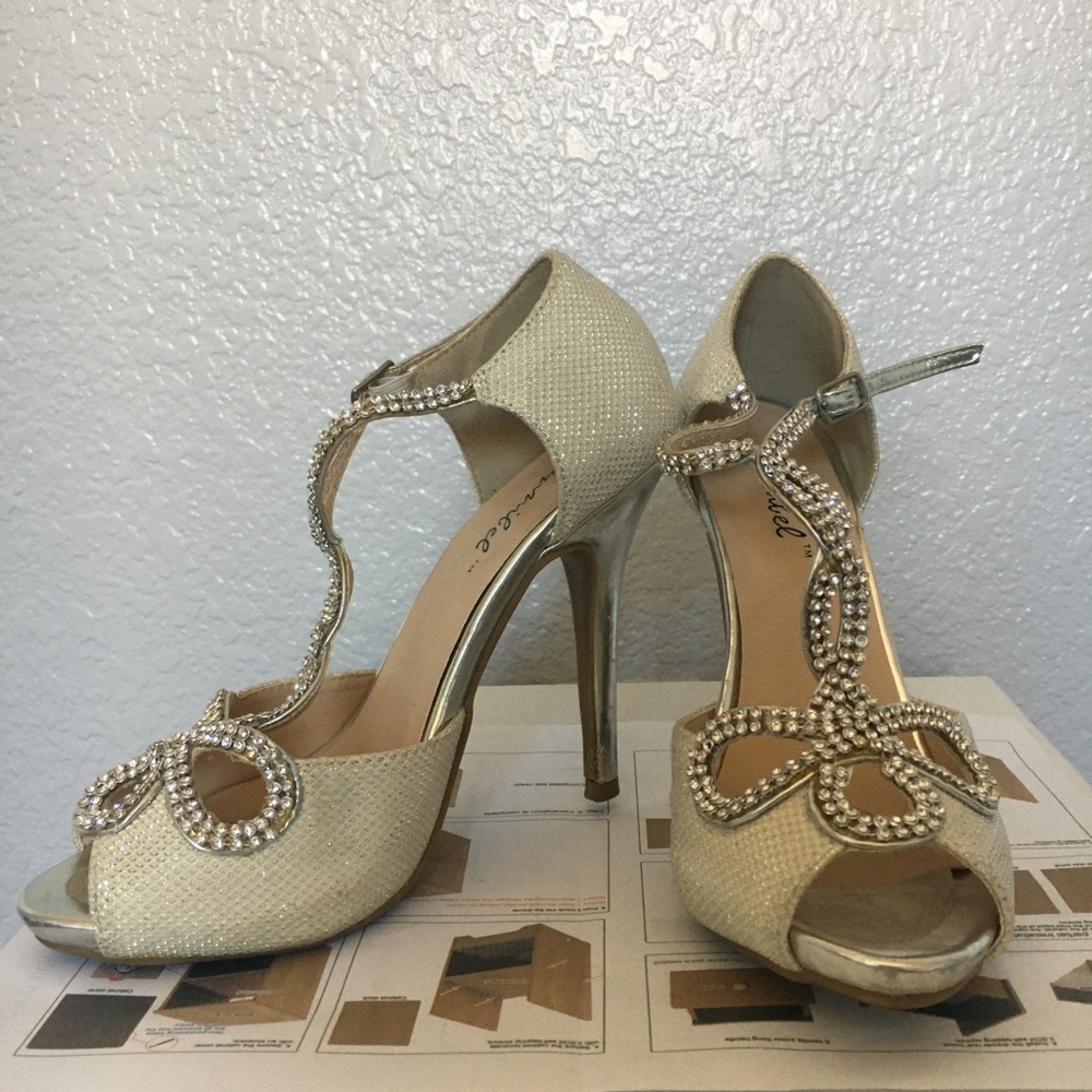 Sparkly silver wearable high heels buy now.